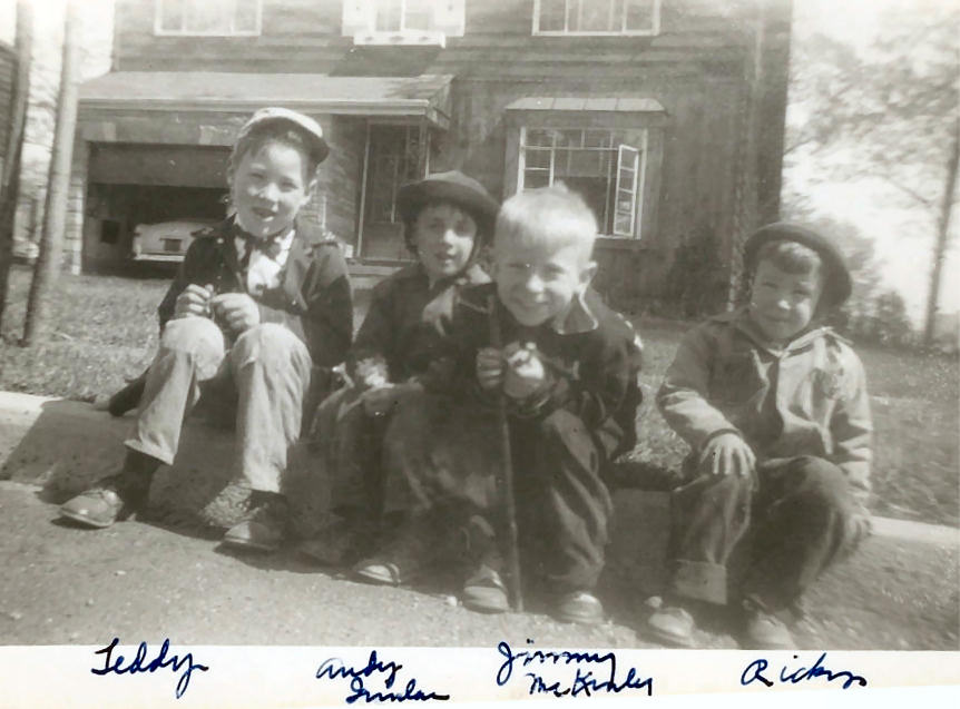 Teddy, Andy Quinlan, Jimmy McKinley, and Ricky sittin' on the curb. 